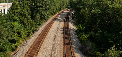Photo of railroad tracks heading off into the distance